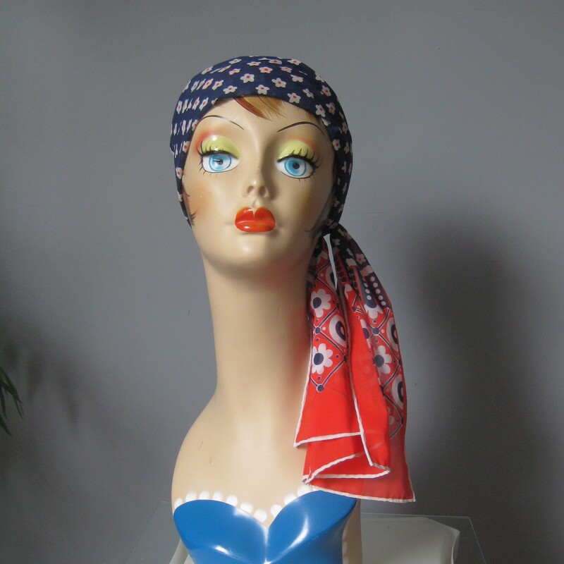 Floral Oblong, RWB, Size: None<br />
<br />
Cute Oblong scarf in red white and blue.<br />
44 x 9.5<br />
lightweight stable woven fabric<br />
the scarf has hand finished edges but no brand or fabric id labels.<br />
<br />
It is in great condition, I found a tiny hole near one corner as shown in one of my photos.<br />
<br />
Thank you for looking.<br />
#64317
