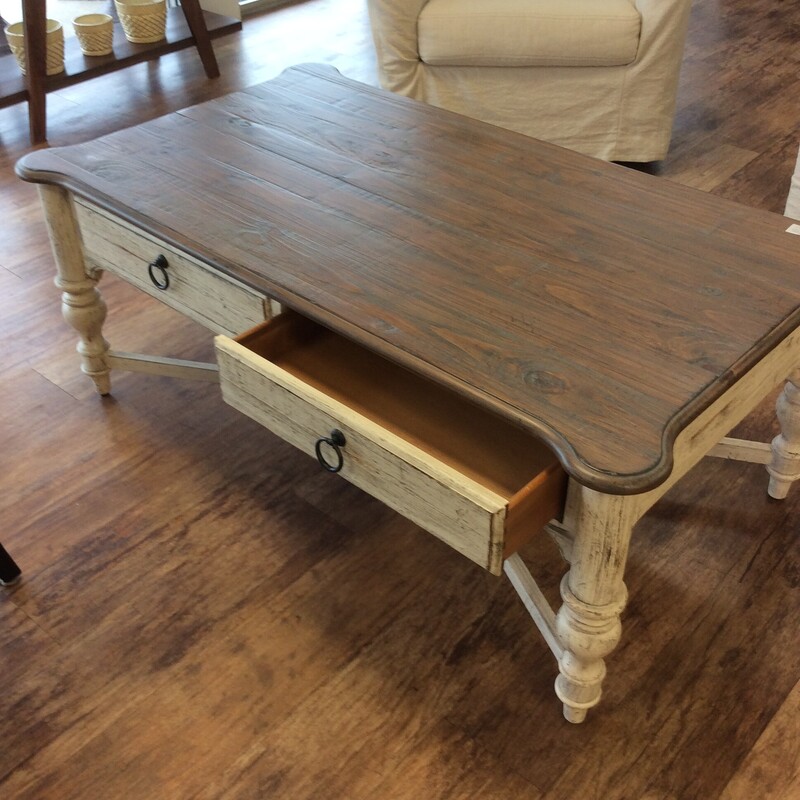 Shabby Chic Coffee Table style that combines elements of vintage and modern styles to create an elegant, yet worn look.