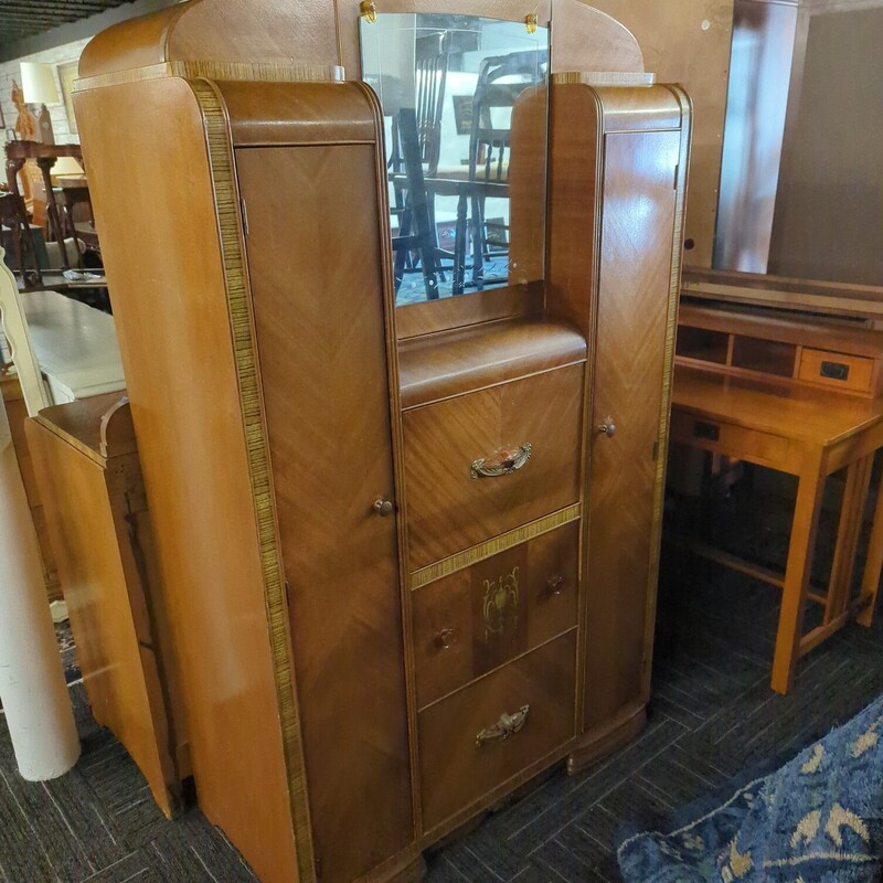 Waterfall armoire. 40in wide 20in deep 68in high.