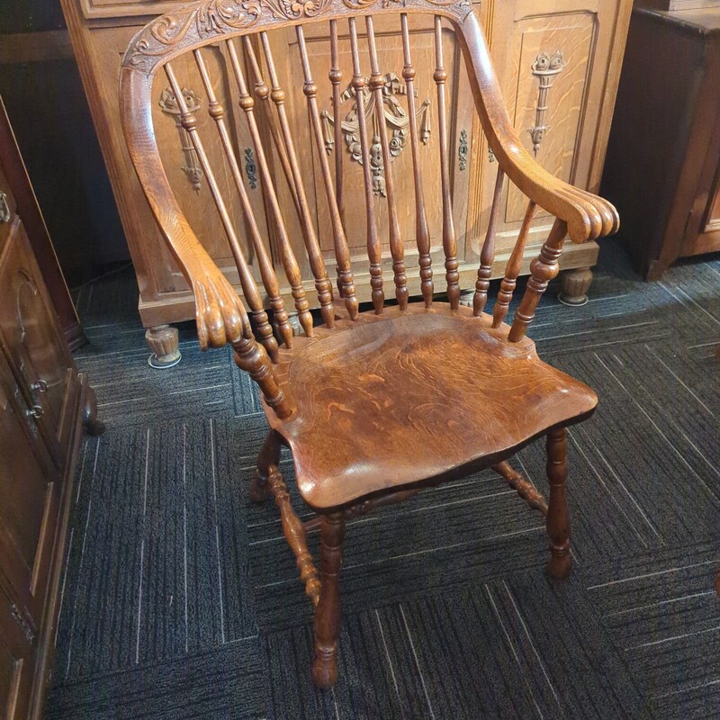 Carved oak chair. 24in wide.