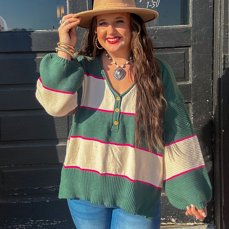 The perfect pink and emerald sweater to wear for fall, pair with jeans and a cute pair of booties!
Available in sizes Small through X-Large.
Madison is wearing a size X-Large.