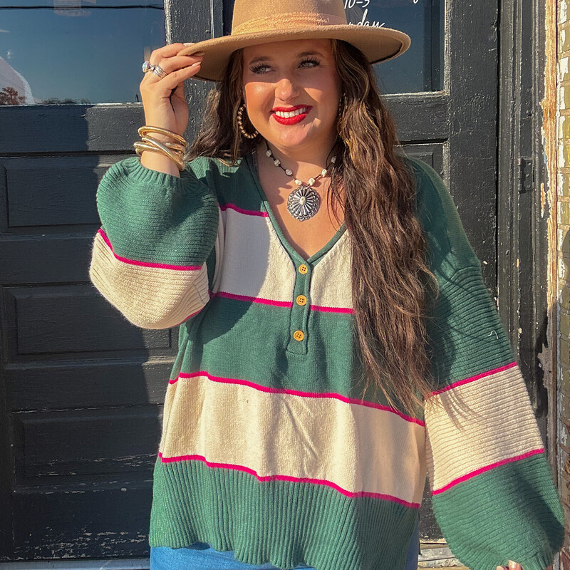 The perfect pink and emerald sweater to wear for fall, pair with jeans and a cute pair of booties!
Available in sizes Small through X-Large.
Madison is wearing a size X-Large.