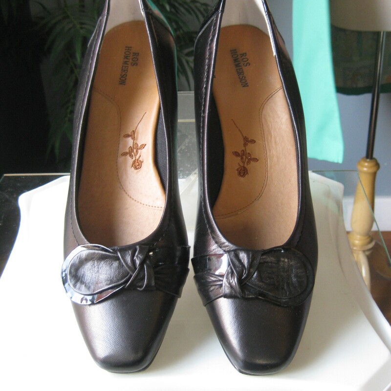 Ros Hommerson black shoes.<br />
Smart and sensible, black leather with patent leather accents.<br />
size 9.5<br />
These have a small wedge heel, round closed toes and skid proof outsole.<br />
Never Worn.<br />
Thanks for looking!<br />
#65852