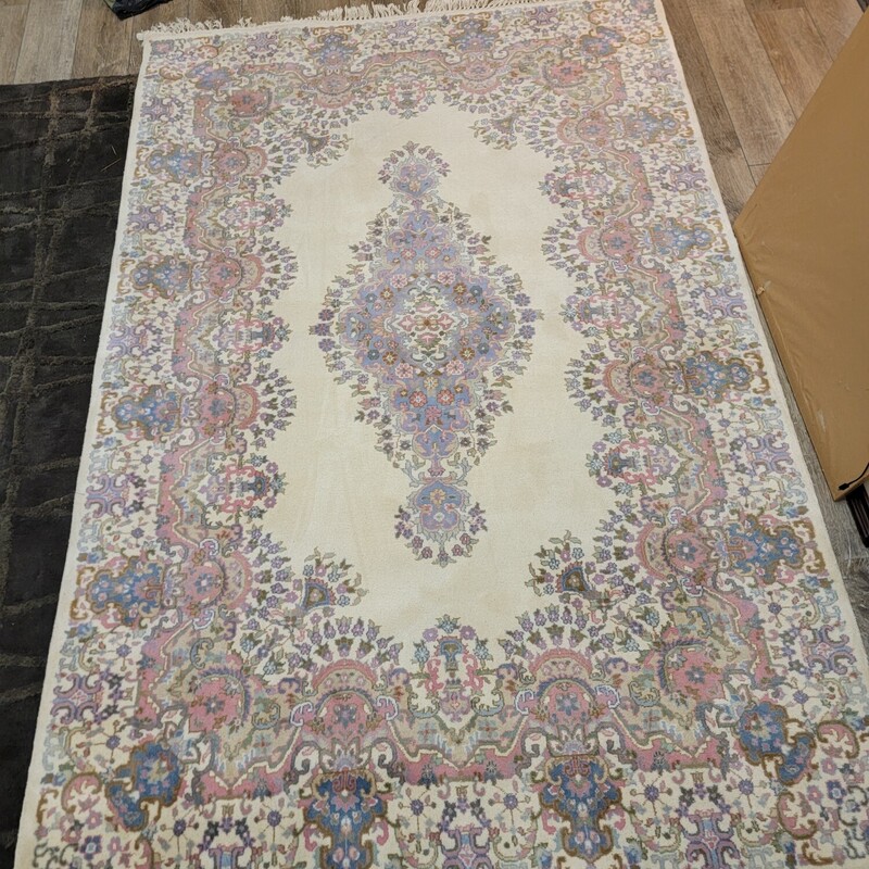 Indian Hand Hooked Wool Rug in the Ketman Style in good condition.  Measures 5'6' by 8' 9'.