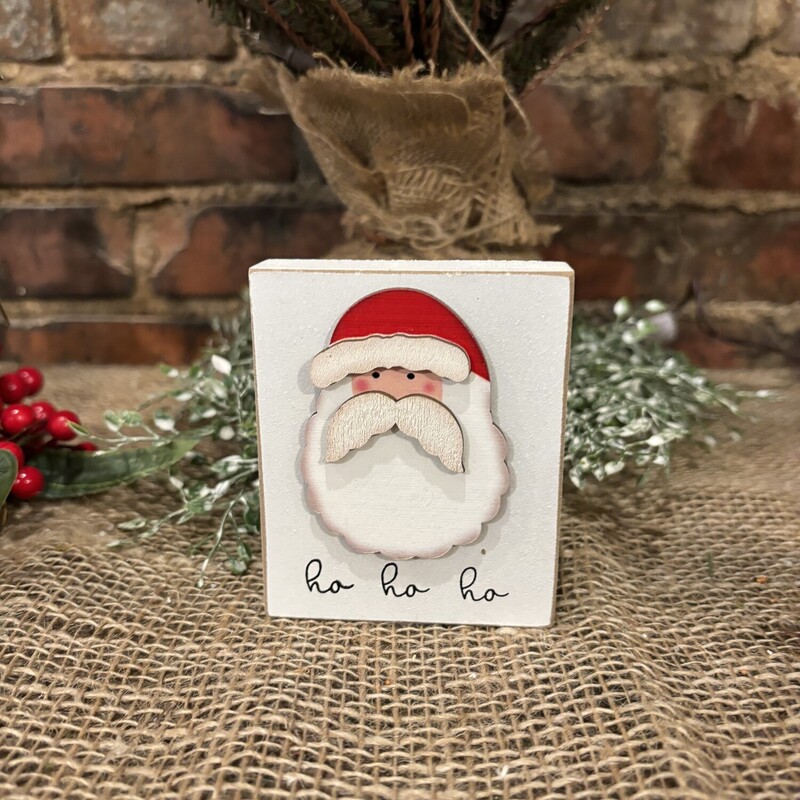 This adorable Santa block is made of wood with a distressed white finish. This block adds a simple yet festive addition to your holiday decor. It can also be displayed on a wall using the keyhole hanger on the back.
Measures 3.5 inches high, 3 inches wide and .75 inches deep