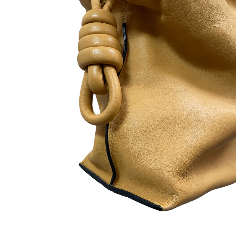 Loewe Flamenco Nappa Calfskin Purse<br />
Warm Gold<br />
<br />
condition: EXCELLENT. Light wear to bottom corners<br />
<br />
Strap length: 89 - 113 cm<br />
Height (inch): 9.6<br />
Width (inch): 11.8<br />
Depth (inch): 4.1<br />
<br />
CURRENT ONLINE<br />
retail: $2600<br />
<br />
Made in Spain