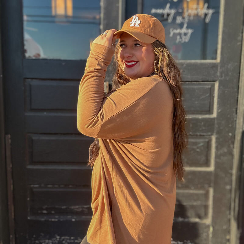 These comfy long sleeve tees are perfect for everyday wear! Dress them up or dress them down, and stay comfy! Perfect for Fall!<br />
Colors: Black, Mocha, Camel<br />
1X through 3X. Madison is wearing a 1X.