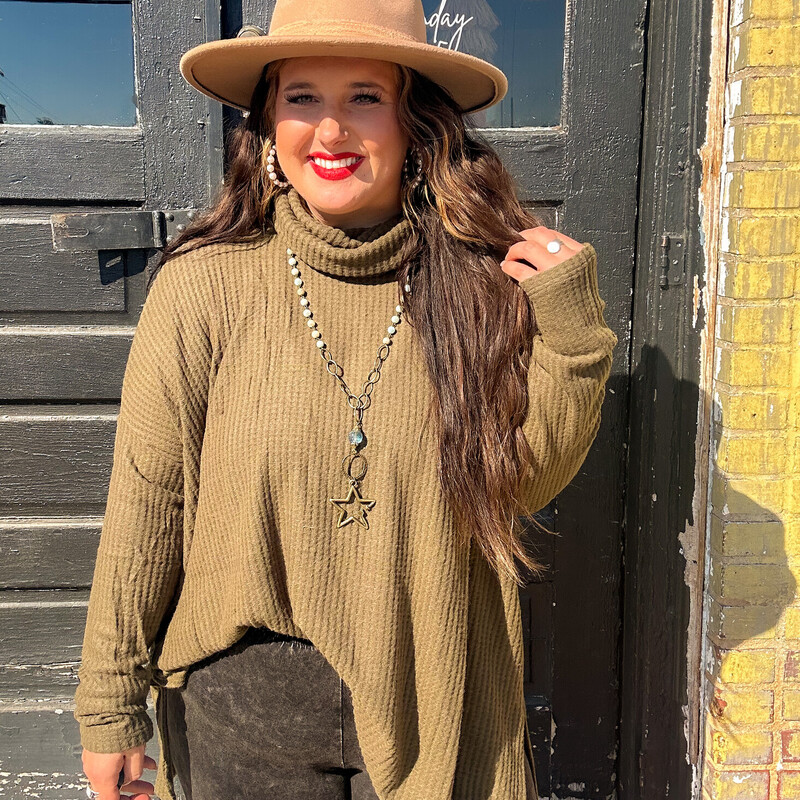 Have you heard the news?! Turtle necks are IN! Keep warm and cozy in these super soft waffle sweaters this fall/winter season! Dress them up with some booties and a cute pair of distressed jeans, you will be the cutest one out!
Colors: Bone, Cocoa, Camel, Burgandy, Olive, Khaki, and Mustard.
Available in sizes 1X-3X. Madison is wearing a 1X.