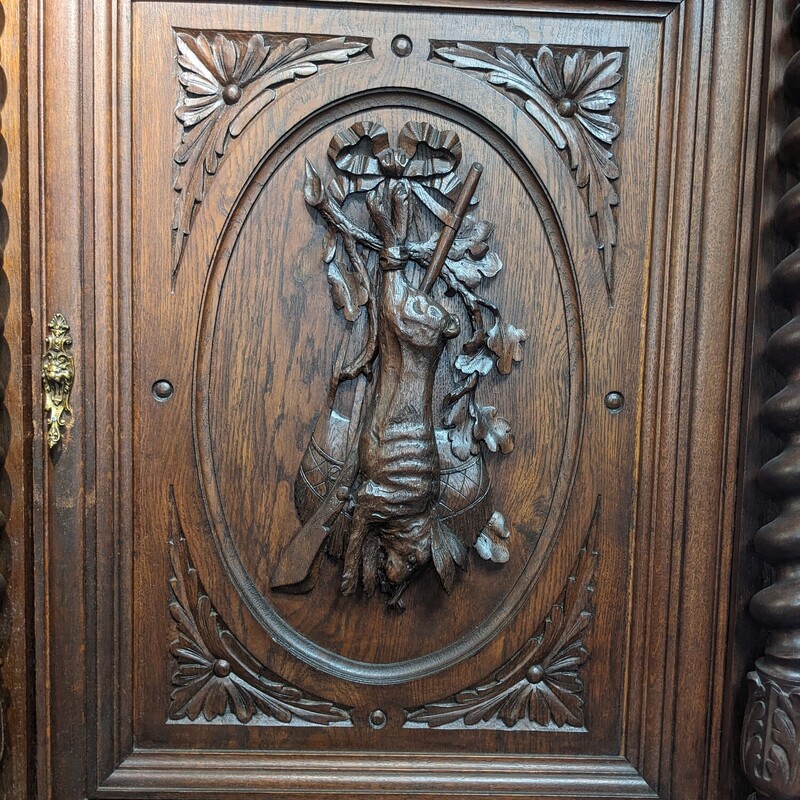 Carved Victorian Server With Backsplash. Measures 100' tall; 58.5' wide; 27' deep. One hinge is missing on a bottom door and back panel is missing from the basement.