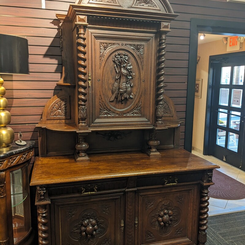 Carved Victorian Server With Backsplash. Measures 100' tall; 58.5' wide; 27' deep. One hinge is missing on a bottom door and back panel is missing from the basement.