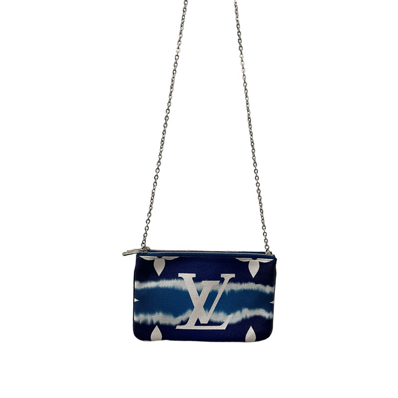 Louis Vuitton Double Zip Blue Limited Edition<br />
Monogram Giant Escale Double Zip Pochette in Blue. This stylish chain wallet is crafted of traditional Louis Vuitton monogram on toile canvas. This shoulder bag features an optional silver chain-link shoulder strap and two top zippers. The pochette opens to a blue microfiber interior with a patch pocket and card slots.<br />
<br />
Dimentions:<br />
Length: 8.25 in<br />
Height: 5.25 in<br />
Width: 1 in<br />
Drop: 21.25 in