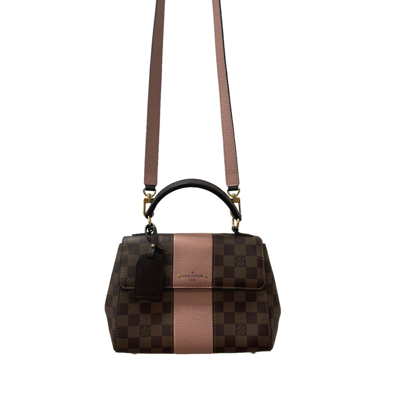 Louis Vuitton Street MM Damier Pink Trim<br />
<br />
This top handle is crafted of Louis Vuitton Damier canvas in brown. This bag features signature pink cowhide leather trim including a strong and sturdy top handle and an optional shoulder strap. The bag has a flap secured by a magnetic snap and opens to a light pink fabric interior with zippered patch pockets.<br />
<br />
Dimensions:<br />
Length: 10.75 in<br />
Height: 7.5 in<br />
Depth: 4.5 in<br />
Handle Drop: 4.5<br />
Strap Drop: 22.75
