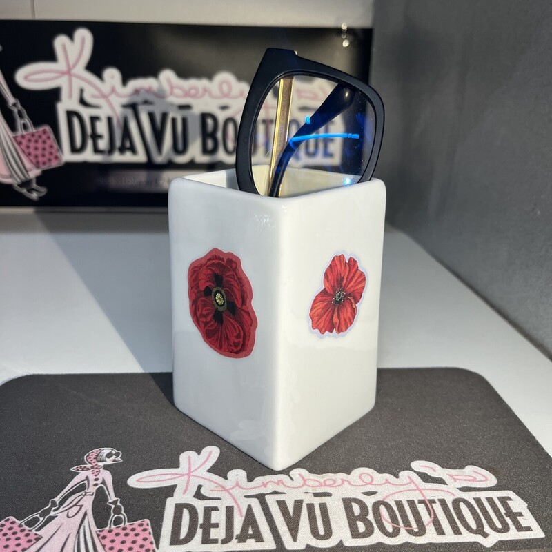 One Of A Kind Poppy Vase can be used for fresh or dried flowers, stationary, your glasses or treats!!  Size: 4 inches tall x 2.5 inches wide features 4 different artsy poppies.