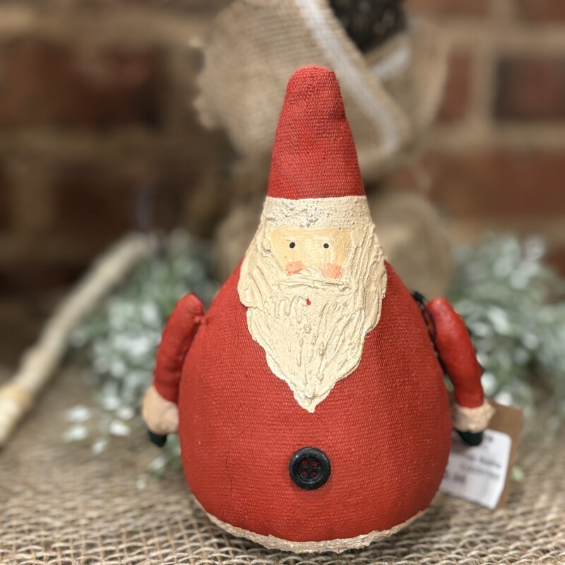Adorable canvas santa will add a touch of whimsy and primitive to your Christmas decor. Just set this cute guy anywhere for some festive fun
Santa measures6 inches tall