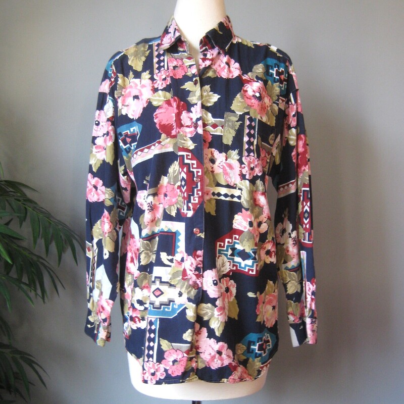 Fun busy floral 80s print shirt by Forenza. 100% cotton
Navy background with big pink flowers and southwestern design elements.
made in India
one chest pocket


Style : Long Sleeved Button down shirt with full sleeves
Fabric Content : 100% cotton


Marked size small, but will fit bigger see measurements below, this may have originally been a mans shirt :)
Flat Measurements please double where appropriate:
Shoulder to shoulder: 22 these are 'dropped'
Armpit to Armpit: 22.25
length: 26
width at hem: 21
Underarm sleeve seam: 18.25


Thanks for looking.
#59975