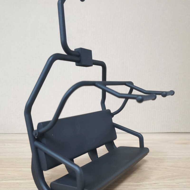 Ski Lift Chair<br />
<br />
Size: 5Wx9H<br />
<br />
Our ski lift chairs are a reminder of the shared conversations, exhilarating descents, and the camaraderie that skiing and snowboarding foster. Infuse your surroundings with the spirit of skiing and snowboarding.