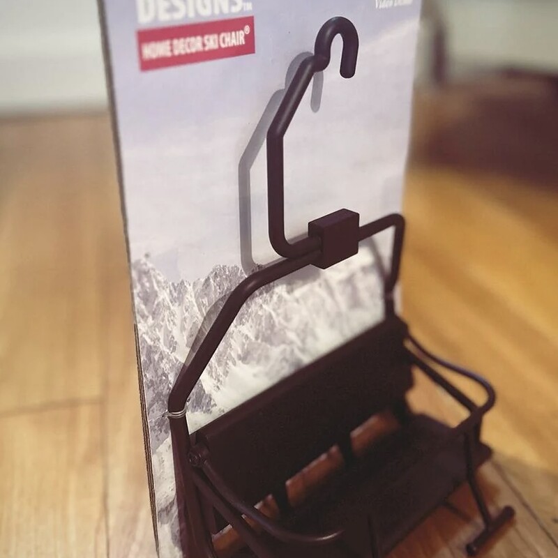 Ski Lift Chair<br />
<br />
Size: 5Wx9H<br />
<br />
Our ski lift chairs are a reminder of the shared conversations, exhilarating descents, and the camaraderie that skiing and snowboarding foster. Infuse your surroundings with the spirit of skiing and snowboarding.