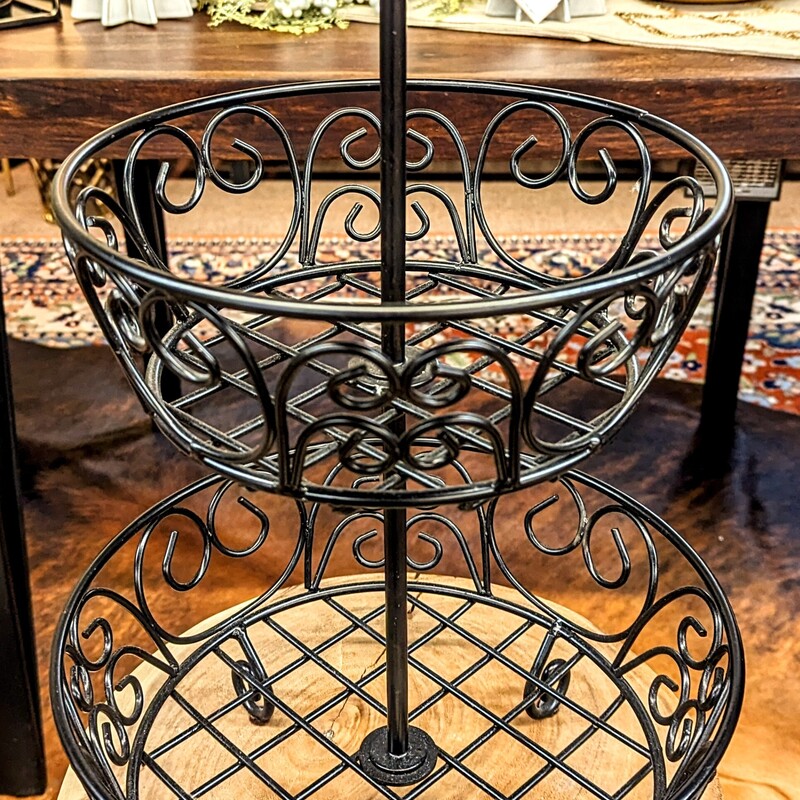 2 Tiered Wrought Iron Fruit or Vegatable Stand
Color: Black Metal with Decorative Design
Size: 10x12x19H