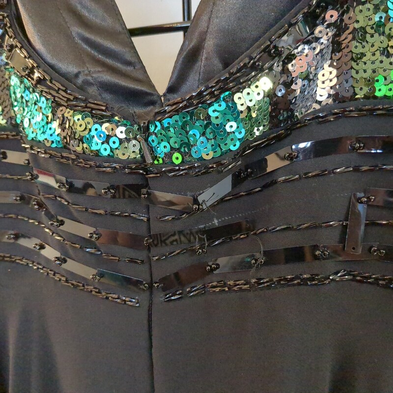 Night Moves, Black, Size: 16
(As Is: loose thread on back, see photo)
Zipper back, Green/Blue Sequins
Beading, Breast Padding