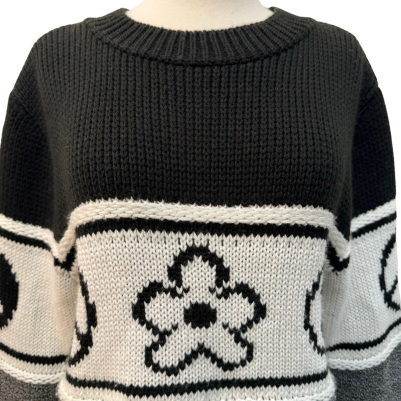 TopShop Flower and Peace Sign Sweater<br />
Cropped Fit<br />
Black and White<br />
Size: Small
