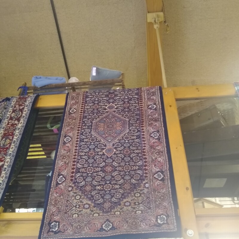 Bidjar Runner
Size:  115 X 31
100% wool, hand knotted rug from Pakistan.BEUTIFUL condition.  Recently professionally cleaned.  Approx 14/14 knots sq/in.  Deep blue and red  design.