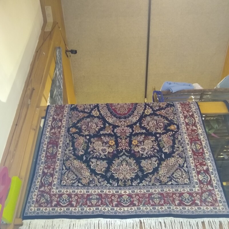 Persian Rug

Size:   55 X 83

Persian 100% wool in deep blue and deep red in color.  Originally priced at $2300 - just professionally cleaned.
This rug is in EXCELLENT condition.