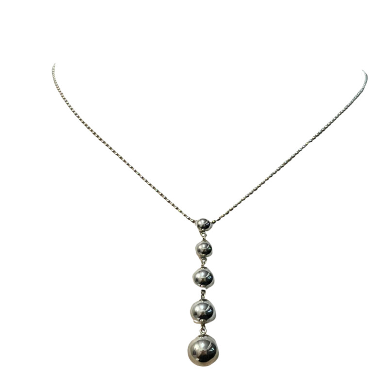 Authentic Tiffany & Co. Graduated 5 Bead Ball Necklace 925 Sterling Silver<br />
Tiffany blue pouch included<br />
Size: 16