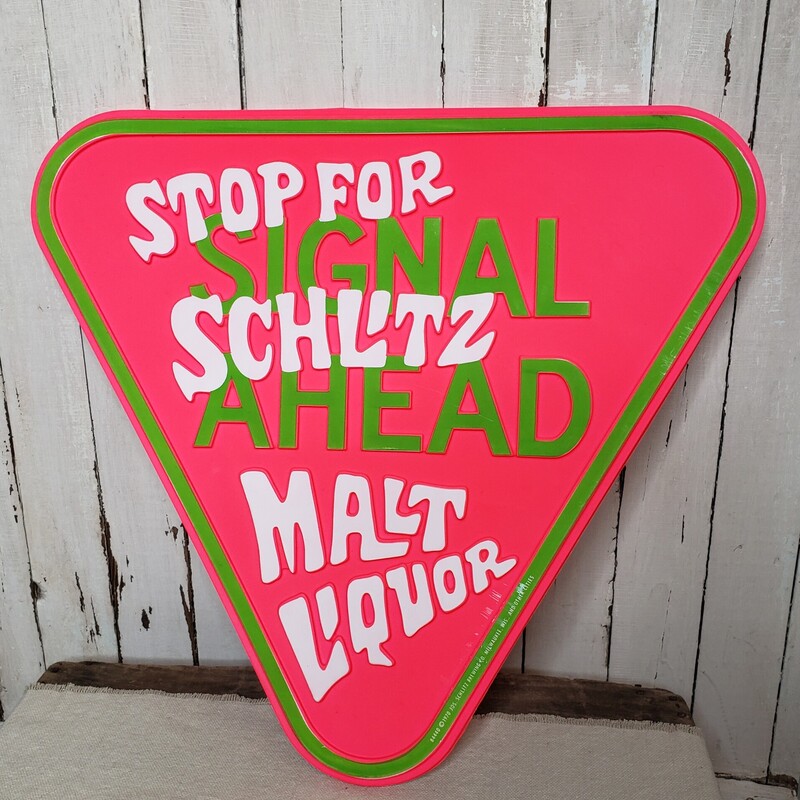 Schlitz Traffic Sign. Vintage plastic neon color sign.