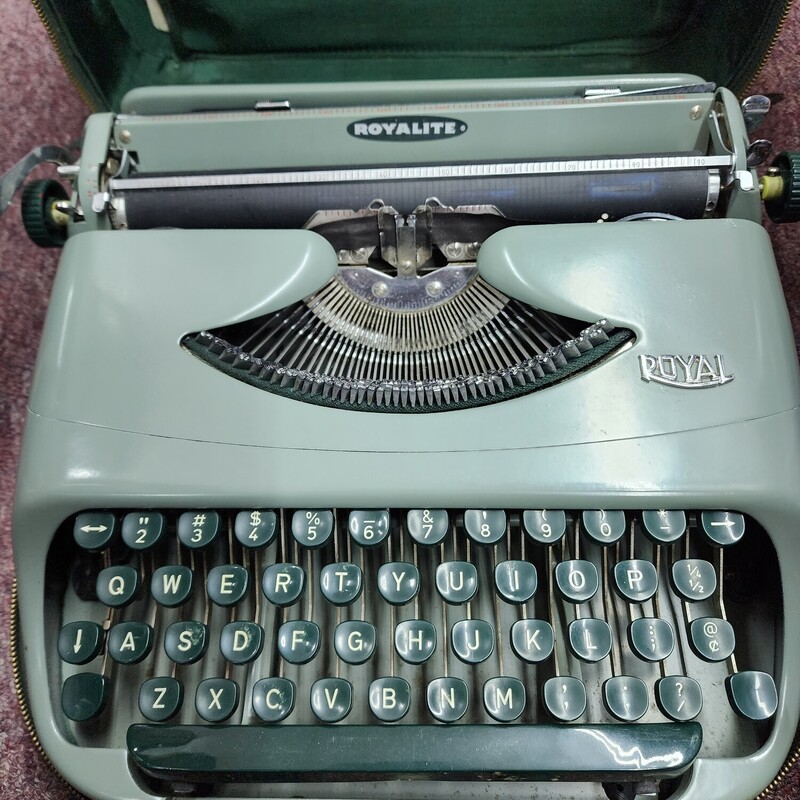 Royalite Typewriter, Green, Size: Portable
with original case, manual & extras