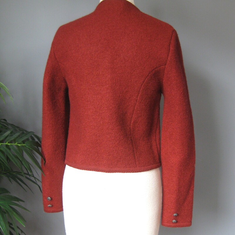 Nice warm rich deep red/rust colored boiled wool cardigan sweater from Carroll Reed
Small Round silver metal buttons
100% wool
Excellent condition, there is one little spot on the front corner where the braid trim is a little damaged, pls see all the photos.
one extra button sewn into the interior just in case.
Marked Size 10
Here are the flat measurements, please double where appropriate:
Armpit to armpit: 18.25
shoulder to shoulder: 14.5
width at hem: 16.25
underarm sleeve seam length:16.75
sleeve from shoulder to seam to cuff: 24.5
Overall length: 20.5

Thanks for looking!
#64974