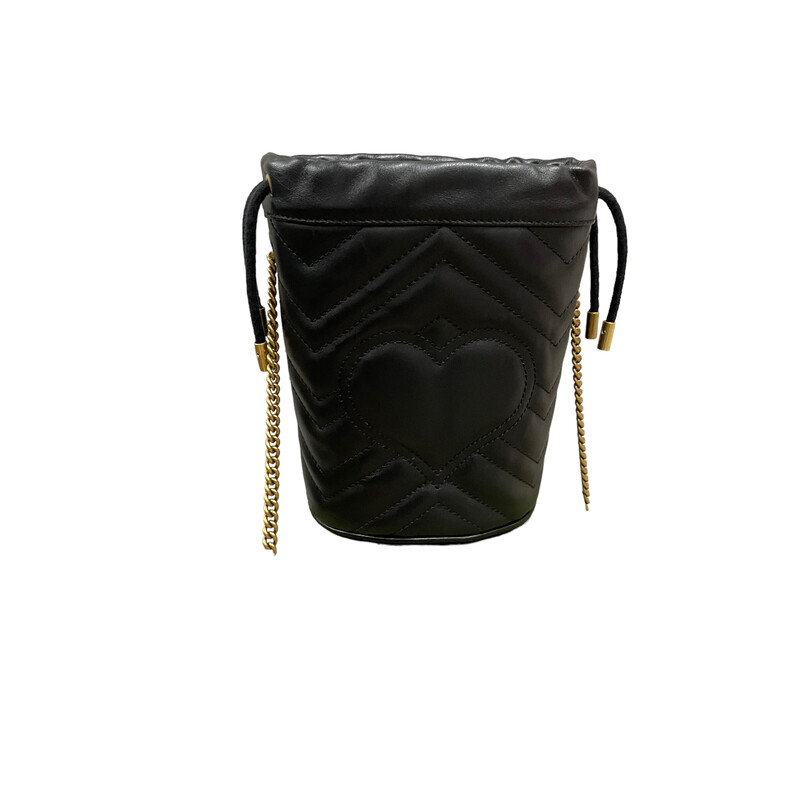 Gucci Marmont Bucket, Black
Size: Mini
Dimensions:
Base length: 5.00
Height: 7.00 in
Width: 4.00 in
Drop: 22.50 in

Calfskin Matelasse Mini GG Marmont 2.0 Bucket Bag in Black. This soft-structured bucket bag is crafted of soft calfskin leather in black with a beautifully stitched chevron pattern. It features an aged chain shoulder strap, a top cinch cord and an aged gold interlocking GG logo. On the back of this beautifully crafted bag, there is a heart stitched design. This bag opens to a beige microfiber interior with card slots and a removable key ring.