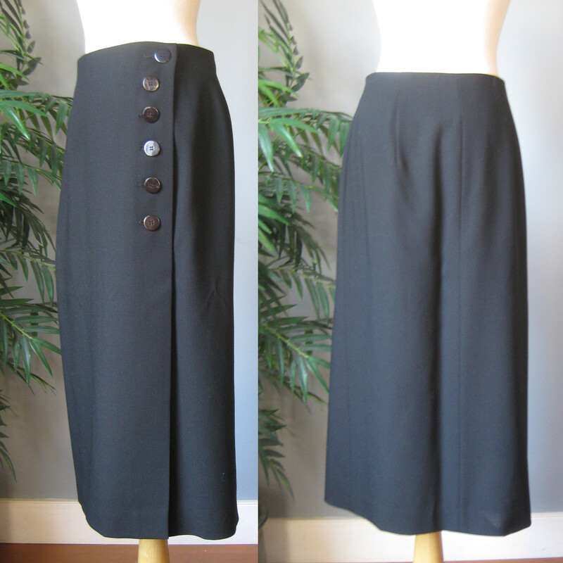 Vtg I Magnin Wool Wrap Sk, Black, Size: Medium
A classic 90s piece, this button down wrap skirt is 100% wool in black.  It's deep midnight black, it was photographed in strong natural light and it looks a little light in some of the photos but it is BLACK.  Gorgeous piece of wool, fully lined and buttons all the way open at the left hip.
It's from luxury brand I. Magnin and has great high end details, including to interior closures at the waist to ensure a secure and close fit.

It's marked size 12, but please use the flat measurements as your ultimate guide to fit.
It's probably better for a size 10, or medium

Waist: 15.5
Hip: 20 1/2
Length: 32 1/2

Excellent condition! no flaws

Thanks for looking.
#66865