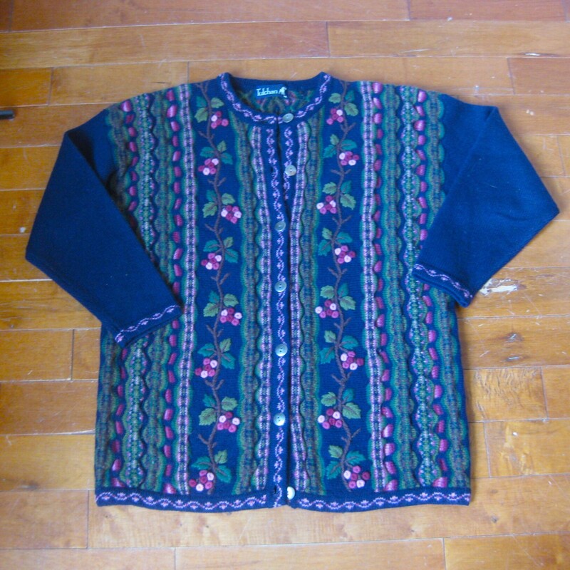 Tulchan Wool Cardigan, Navy/Pnk, Size: M/L<br />
Vintage Tulchan cardigan sweater<br />
navy blue with that coogi like vertical design on the front and back.<br />
the front is further decorated with floral embroidery.<br />
Simple metal buttons (there is an extra one on the inside)<br />
100% Wool<br />
<br />
It's marked size M/L<br />
flat measurements:<br />
shoulder to shoulder: 22.5<br />
armpit to armpit: 22.75<br />
width at hem, buttoned and unstretched: 20.5<br />
length: 27.75<br />
underarm sleeve seam: 18.5<br />
excellent condtion, no flaws!<br />
<br />
thanks for looking!<br />
#68314