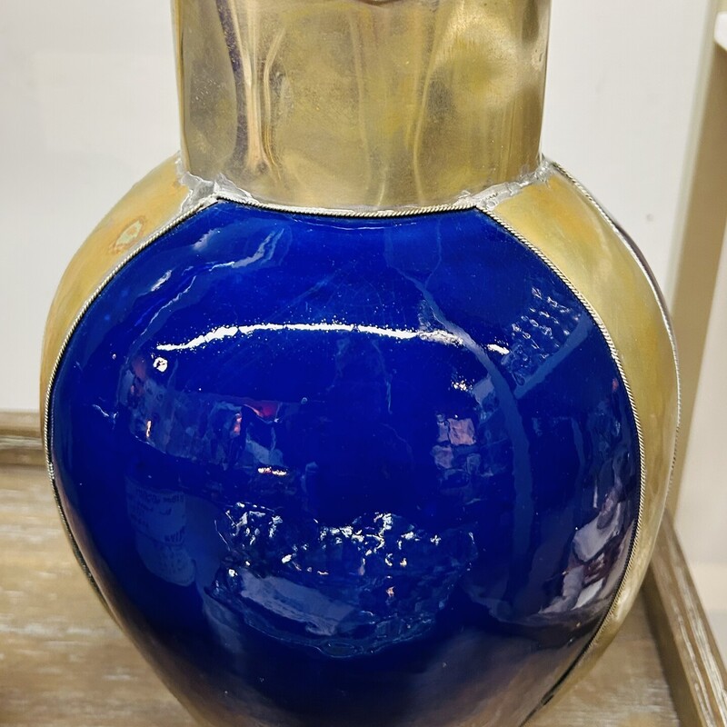 Cobalt Vase With Metal Overlay
Blue Silver Size: 7 x 11H