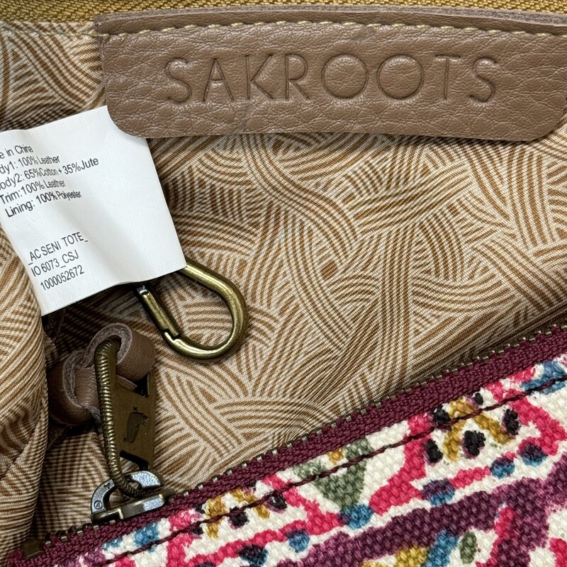 Sakroots Leather and Canvas Tote
Cute Printed pattern On Canvas
Leather Color:  Tan
Comes with Matching Coin Purse