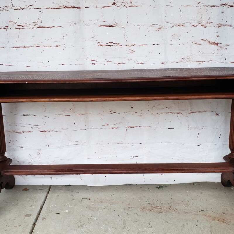 Antique Entry or Sofa Table. Has storage shelf on one side. Size: 56L x 13.5D x 27T
