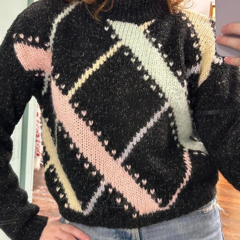80s cropped sweater<br />
how cute is this!!!<br />
Charcoal sweater with wide & thin stripes in aqua, pink & yellow trimmed with little hearts.<br />
has a mock turtleneck, shoulder pads<br />
material feels like an acrylic blend<br />
<br />
flat lay measurements<br />
~chest...20.5<br />
~waist...15-17<br />
~length...19<br />
<br />
size medium