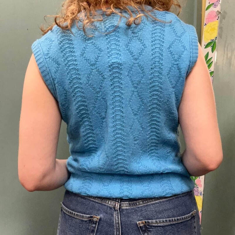 how cool is this!!!
bright baby blue, 100% acrylic

flat lay measurements
chest...17 inches
waist..14.5-18 inches
length...24.5 inches

60s lamb knit blue acrylic vest, size medium
