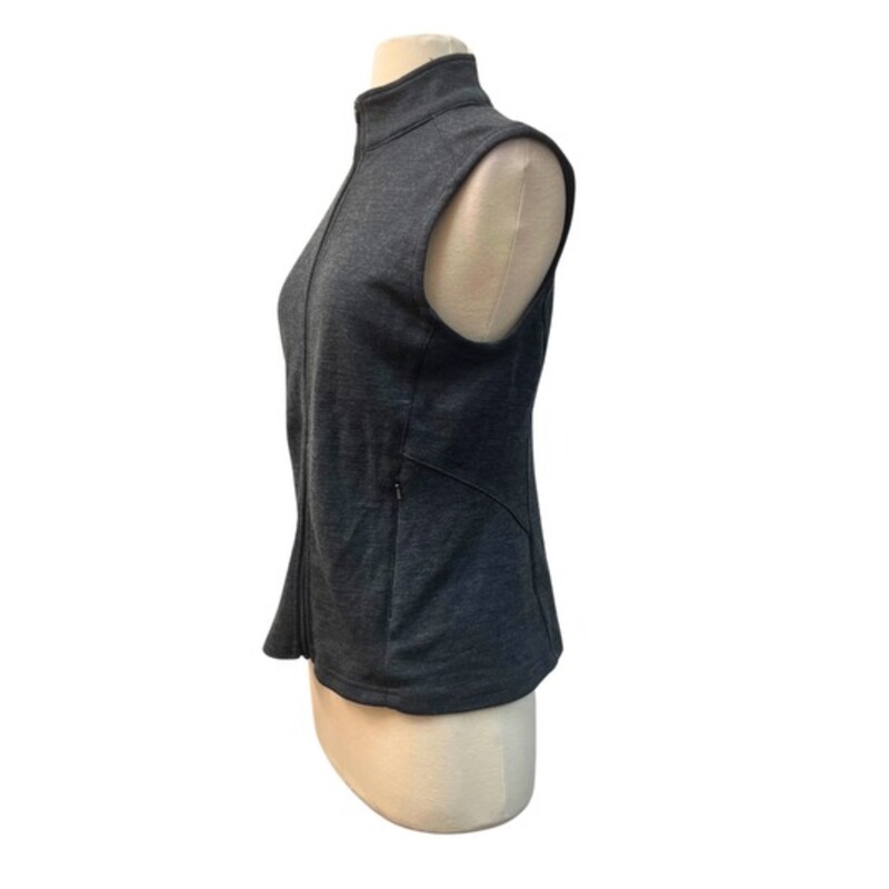 Ibex Merino Wool Vest<br />
<br />
Keep your core comfortable with densely knit merino wool in a versatile, low-profile vest design.<br />
Fitted design fits close to the body with sleek seam lines<br />
<br />
Dark Gray<br />
Size: Large