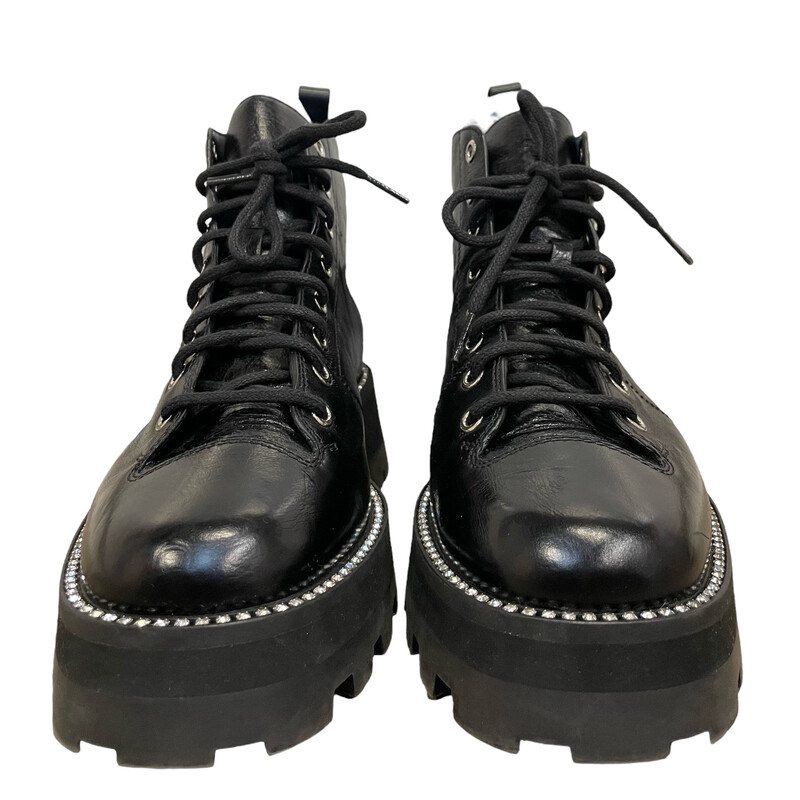 JIMMY CHOO Calfskin Crystal Embellished Colby Combat Boots  in Black. These boots are crafted of calfskin leather. They feature a 2-inch rubber heel, black lace-ups, and and crystals embellished around the welt<br />
Size 38 .