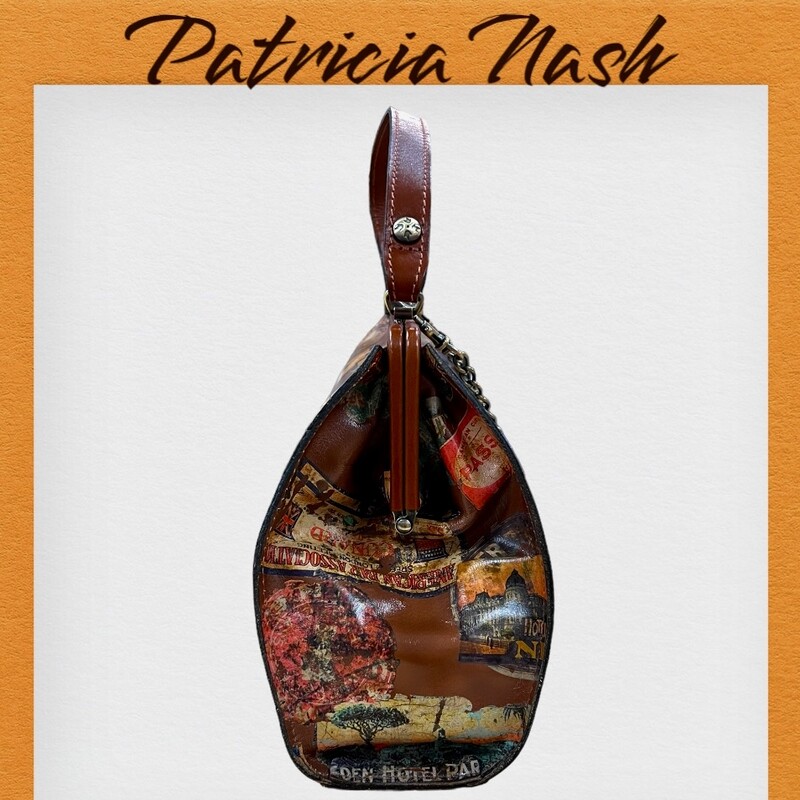 Patricia Nash
Bonifati Frame Bag - Vintage Travel Sticker
Capturing the romance of travel, Patricia was inspired by her own beloved antique trunks, suitcases, and train cases to create this collection that is the latest evolution of her Vintage Travel Sticker print. Reflecting her longstanding love of exploration and adventure, the stickers of this print are colorful, feminine, whimsical, and beautiful. Featured in new and iconic styles, this collection has timeless appeal.
An updated take on a classic style, the Bonifati, in Vintage Travel Sticker print on supple leather, is a must-have. It features a top handle and a removable chain strap to carry it two ways.
-100% full-grain leather
-Interior: 1 zip pocket, 2 slip pockets; faux suede lining, 100% polyester
-Exterior: deep embossed grape leaf logo, protective metal feet, burned edge finish
-Push-lock closure
-Signature brushed brass hardware, heavy handcrafted stitching
-Dimensions: 11 5/8\"(W) x 8 3/4\"(H) x 3 1/2\"(D)
-Strap drop: 23\"
-Handle drop: 5 3/4\"
Original Retail Price: $199.99
This bag is in like new condition.  No marks or flaws.
