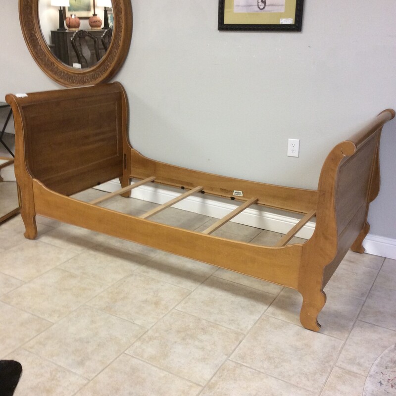 This sleigh   Daybed by Ethan Allan is made of Maple and comes with side rails and slats.