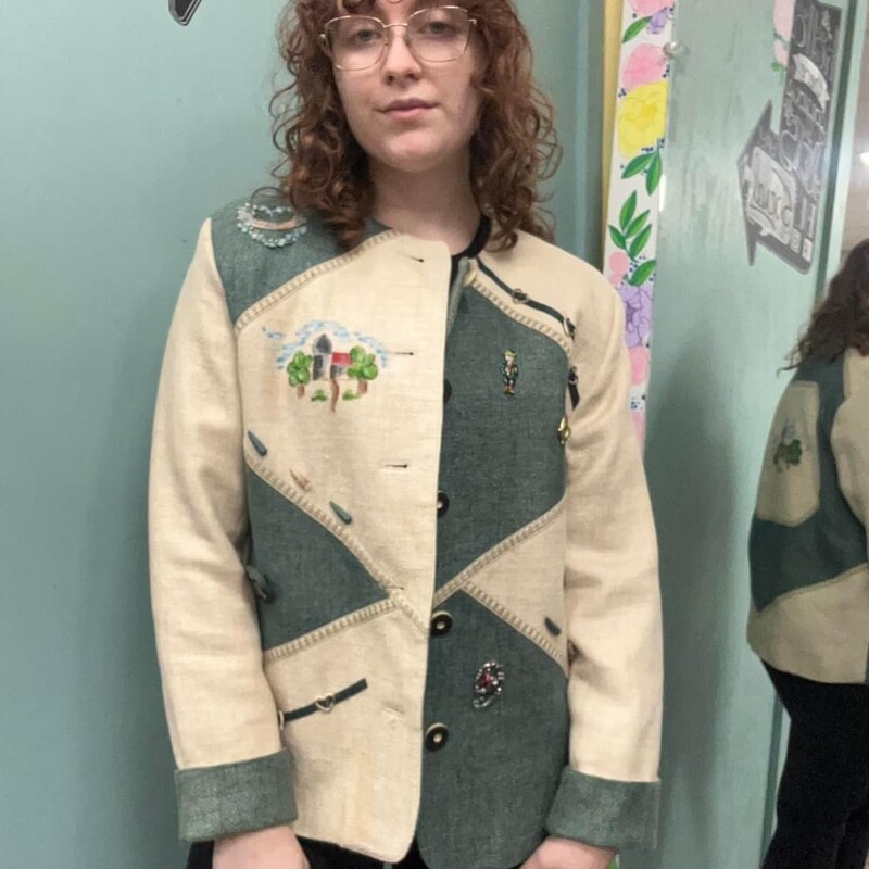 this blazer!!! You all!!  The pictures alone, you must see this in person!!!
from the 1980s
handpainted with pins on this blazer

features a handpainted castle/landscape
a viel gluck pin & a plethora of others
heart & ribbon accents
stiff boxy fit
labeled a size 40
shown on a medium model
tag is in german