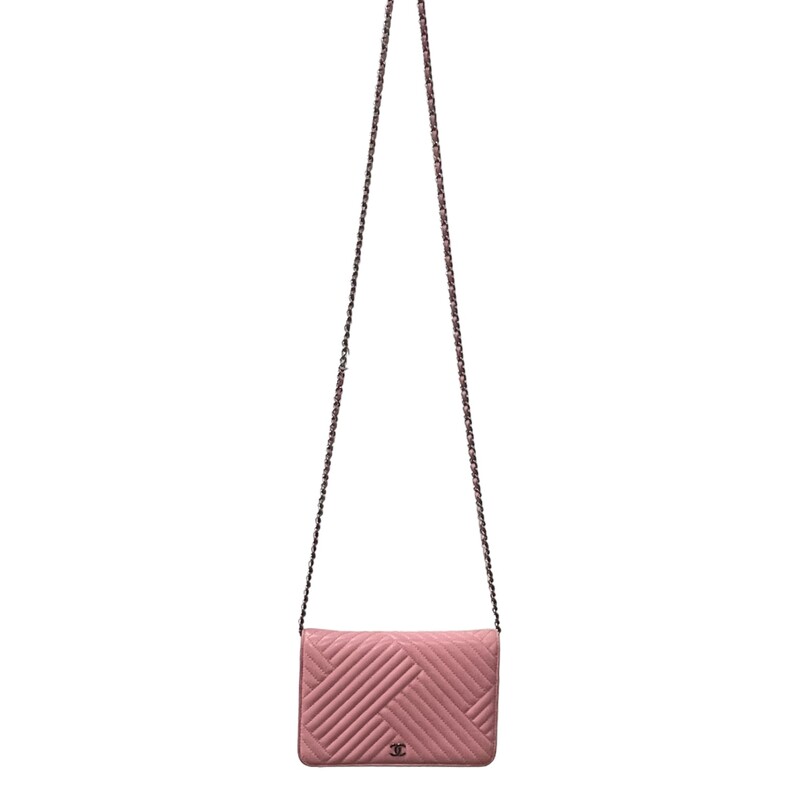 Chanel Chevron Crossing Pink WOC
Chanel Crossbody Bag
By Karl Lagerfeld
Pink Lambskin
Interlocking CC Logo, Quilted Pattern & Chain-Link Accent
Silver-Tone Hardware
Chain-Link Shoulder Strap
Grosgrain Lining & Three Interior Pockets with Card Slots
Snap Closure at Front

Dimensions:
Approx 4.9 x 7.5 x 1.4

Code: 22701983
Year:

** Wear on the back upper corner on leather
Corner wear on all corners