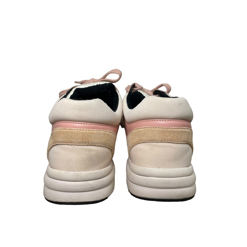 Chanel Trainer Pink<br />
<br />
Size 37<br />
<br />
Stain on left shoe at the toe and right shoe on upper part on the toe. See photos for details<br />
<br />
CHANEL Nylon Lambskin Suede Calfskin CC Sneakers size 38 in Pink, White and Black. These stylish sneakers are crafted of pink suede calfskin leather with dark beige accents, pink and beige soles, and a white CHANEL logo on the side.