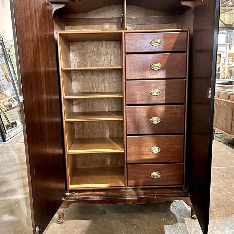Armoire<br />
76.5in high, 48in wide, 21.5in deep