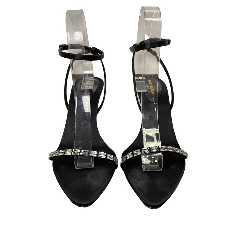 YSL Satin Crystal Black Sandals

Size 39

SAINT LAURENT's 'New Nuit' sandals are sleek and glamorous. Worn on the Fall '22 runway, they're made from black satin in a point-toe silhouette and topped with light-catching crystals along the slim straps.