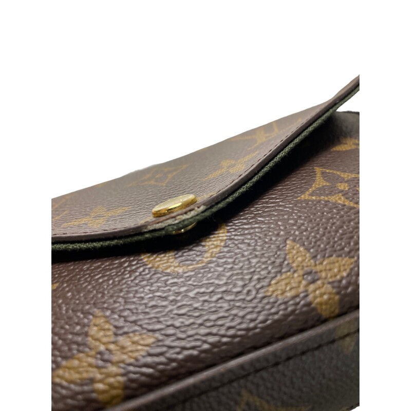 Louis Vuitton Felicie Strap & Go<br />
<br />
Dimensions:<br />
17 x 9.6 x 3.5 cm<br />
Strap: Removable, adjustable<br />
Strap Drop: 36.0 cm<br />
Strap Drop Max.: 55.0 cm<br />
<br />
Note: The corners of the flap and the edges of the handbag have wear. See photos.<br />
<br />
This is an authentic LOUIS VUITTON Monogram Felicie Strap & Go in Kaki. This chic crossbody bag is crafted of monogram-coated canvas. The bag features a removable khaki canvas strap, a coin pouch and gold hardware. The front flap opens to a green fabric interior with card slots and a patch pocket.<br />
<br />
Khaki Green<br />
Monogram coated canvas<br />
Jacquard textile strap<br />
Microfiber and cowhide-leather lining<br />
Gold-color hardware<br />
Press-stud closure<br />
Removable card holder<br />
Inside flat pocket<br />
3 card slots