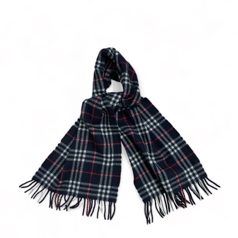 BURBERRY Wool Nova Check Fringe Scarf in Blue. This exceptional scarf is 100% lambswool in a nova checkered print in dark blue with a fringe trim.

Length: 80.00 in
Height: 12.00 in
