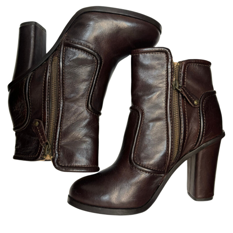 Frye Leather Sylvia Piping Boots<br />
Soft, vintage leather upper<br />
Leather-wrapped heel with center back seam<br />
Double zip openings on inside and outside of boot<br />
Breathable leather lining<br />
Leather outsole with rubber forefoot pad for non-slip performance<br />
Color: Rustic Brown<br />
Size: 7